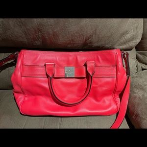 Kate Spade Hot Pink 15 inches wide and 8 inches high hand bag